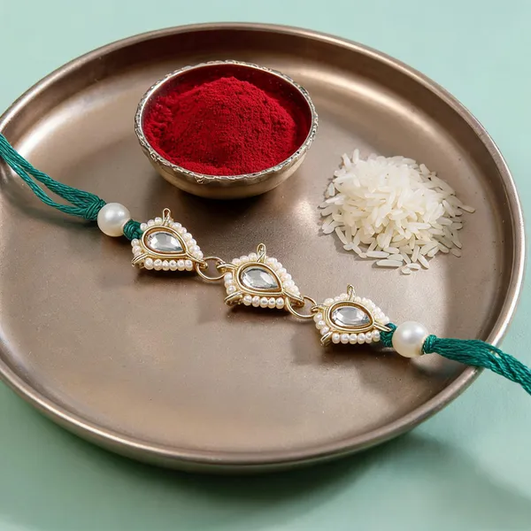 Delicate_Pearl_Beads_Green_Rakhi_with_Roli_Chawal_&_Rakshabandhan_Card