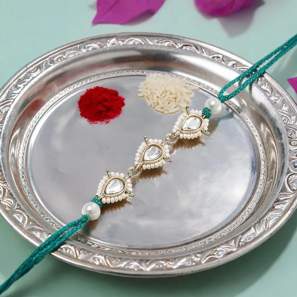 Delicate_Pearl_Beads_Green_Rakhi_with_Roli_Chawal_&_Rakshabandhan_Card