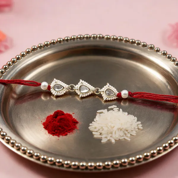 Delicate_Pearl_Beads_Maroon_Rakhi_with_Roli_Chawal_&_Rakshabandhan_Card