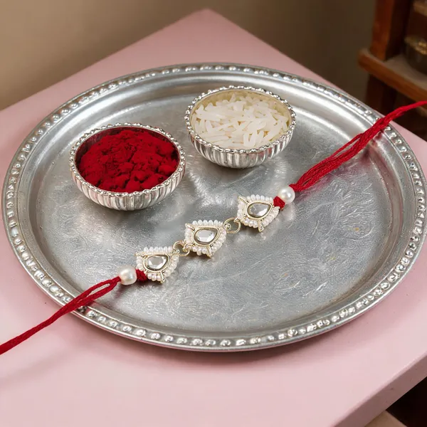 Delicate_Pearl_Beads_Maroon_Rakhi_with_Roli_Chawal_&_Rakshabandhan_Card