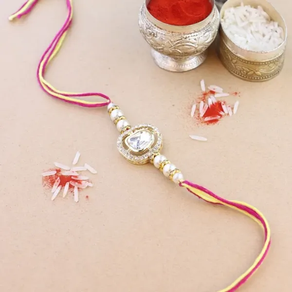 Dazzling_Pearl_Kundan_Stone_Rakhi_with_Roli_Chawal_&_Card