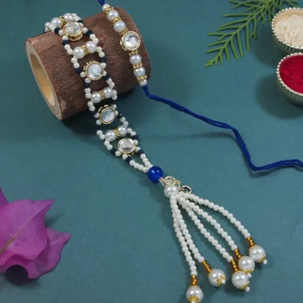 Elegant_Bhaiya_Bhabhi_Blue_Lumba_&_Pearl_Rakhi_With_Roli_Chawal_&Card