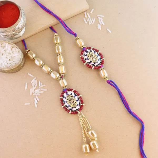 Elegant_Bhaiya_Bhabhi_Lumba_&_Pearl_Rakhi_With_Roli_Chawal_&_Card