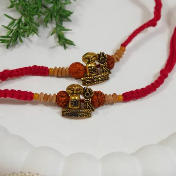 Sacred_Shivling_Rakhi_Set_with_Roli_Chawal_&_Rakshabandhan_Card_(Pack_of_2)
