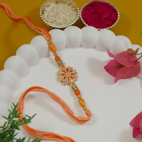 Enamel_Designer_Rakhi_Combo_for_Bhai_-_Mint_&_Orange_Thread_with_Roli_Chawal