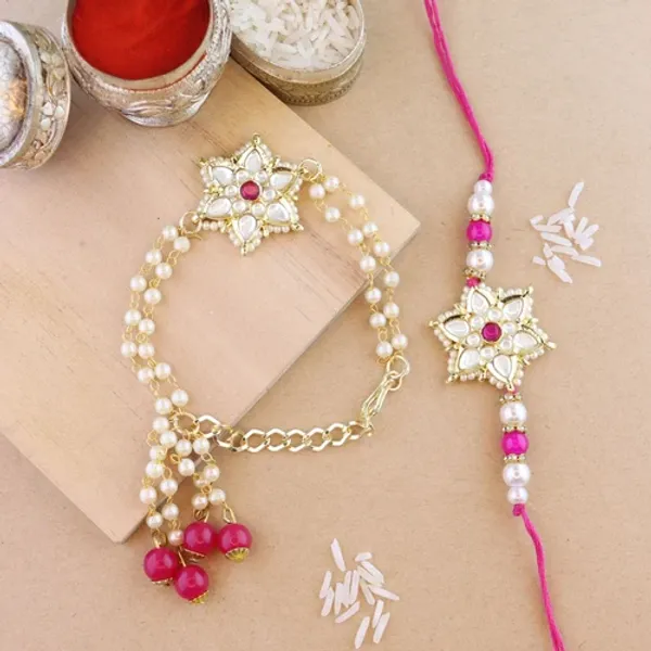Elegant_Bhaiya_Bhabhi_Lumba_&_Pearl_Rakhi_With_Roli_Chawal_&_Card