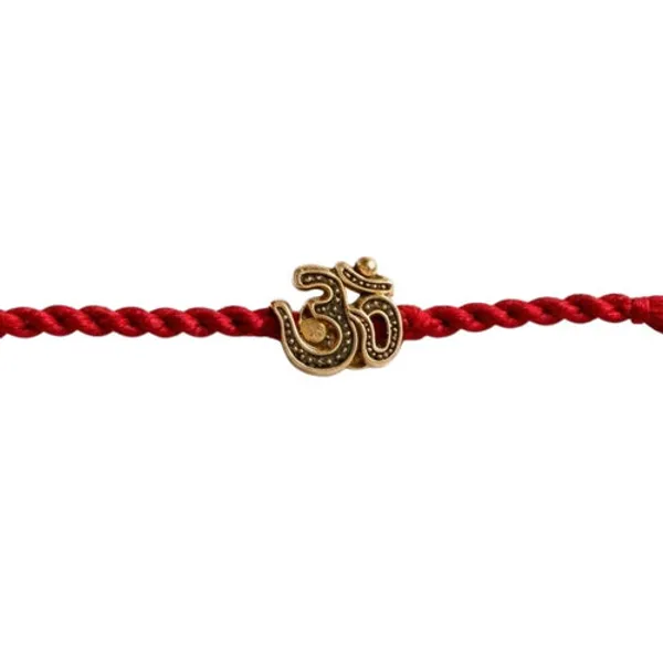 Om_Symbol_Rakhi_with_Roli_Chawal_&_Rakshabandhan_Card