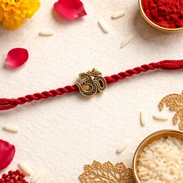 Om_Symbol_Rakhi_with_Roli_Chawal_&_Rakshabandhan_Card