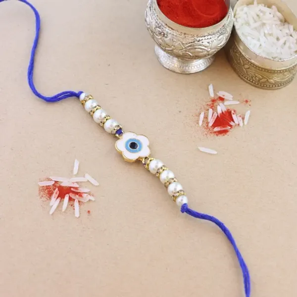 Red_And_Green_Thread_Beaded_Rakhi_For_Raksha_Bandhan_For_Brother