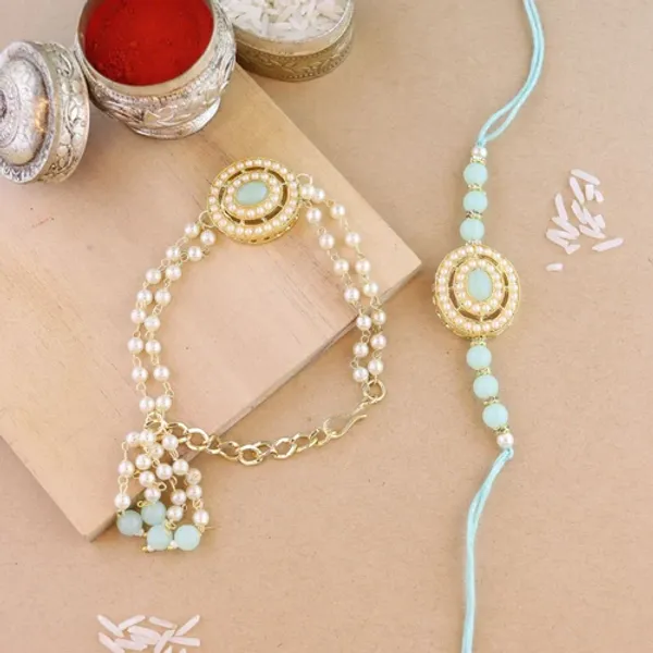 Elegant_Bhaiya_Bhabhi_Lumba_&_Pearl_Rakhi_With_Roli_Chawal_&_Card