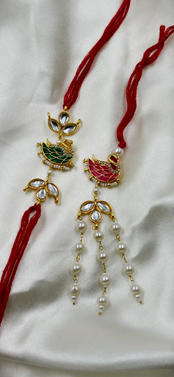 Red_Thread_Gold_Tone_Bird_Motif_Pearl_Drop_Rakhi