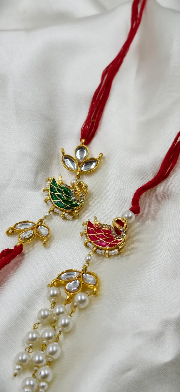 Red_Thread_Gold_Tone_Bird_Motif_Pearl_Drop_Rakhi