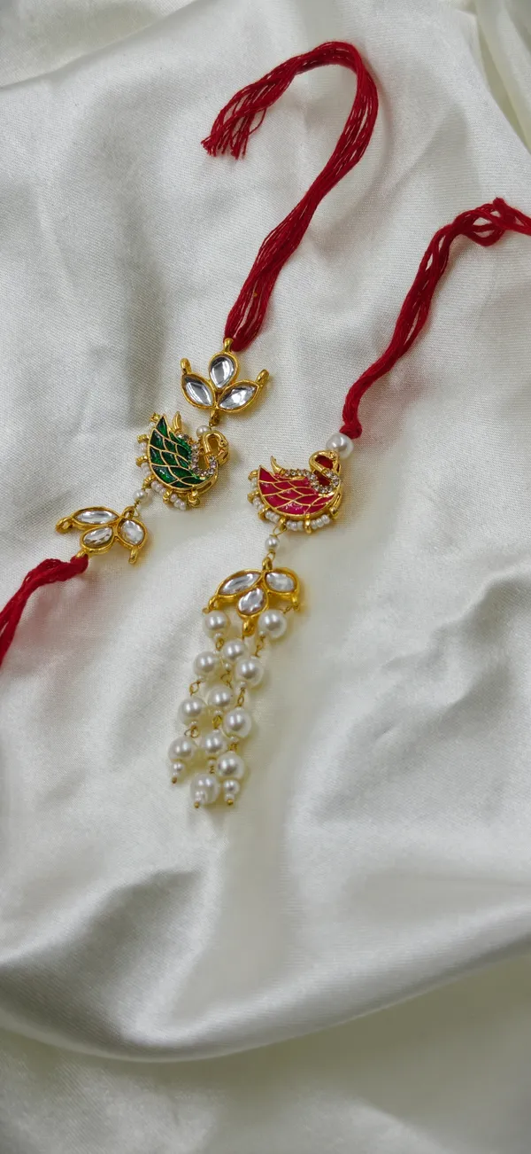 Red_Thread_Gold_Tone_Bird_Motif_Pearl_Drop_Rakhi