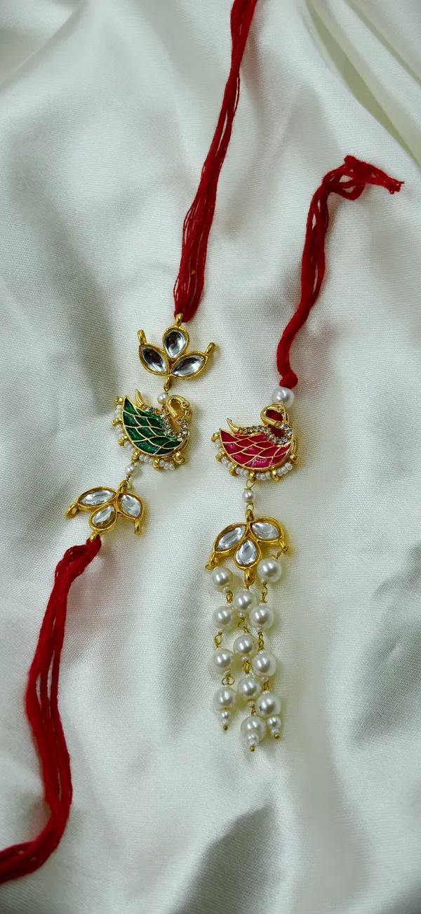 Red_Thread_Gold_Tone_Bird_Motif_Pearl_Drop_Rakhi