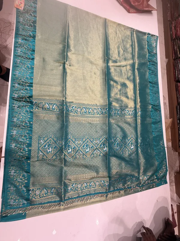 Teal_Blue_Golden_Kalamkari_Silk_Saree_For_Women