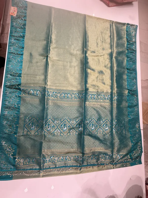 Teal_Blue_Golden_Kalamkari_Silk_Saree_For_Women
