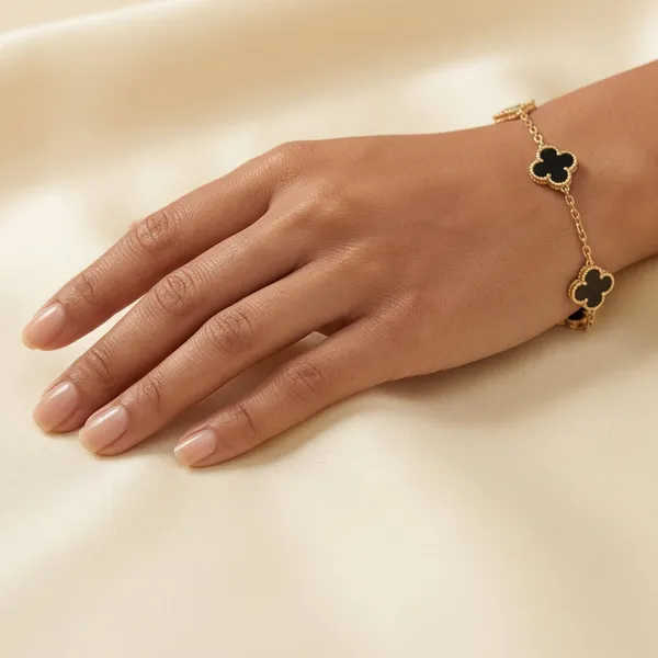 Gold_And_Black_Alloy_Black_Enamel_Clover_Charm_Bracelet_For_Women