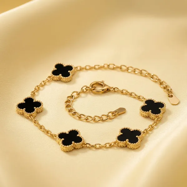 Gold_And_Black_Alloy_Black_Enamel_Clover_Charm_Bracelet_For_Women