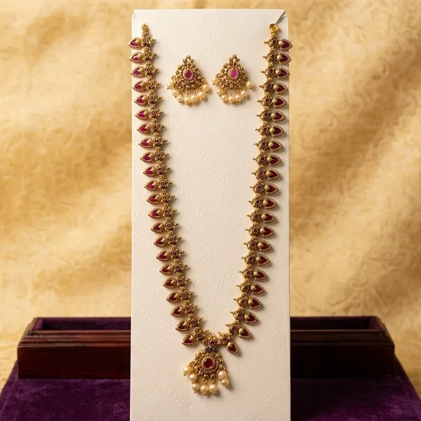 Gold_Alloy_Lakshmi_Temple_Ruby_Pearl_Necklace_Set_For_Women