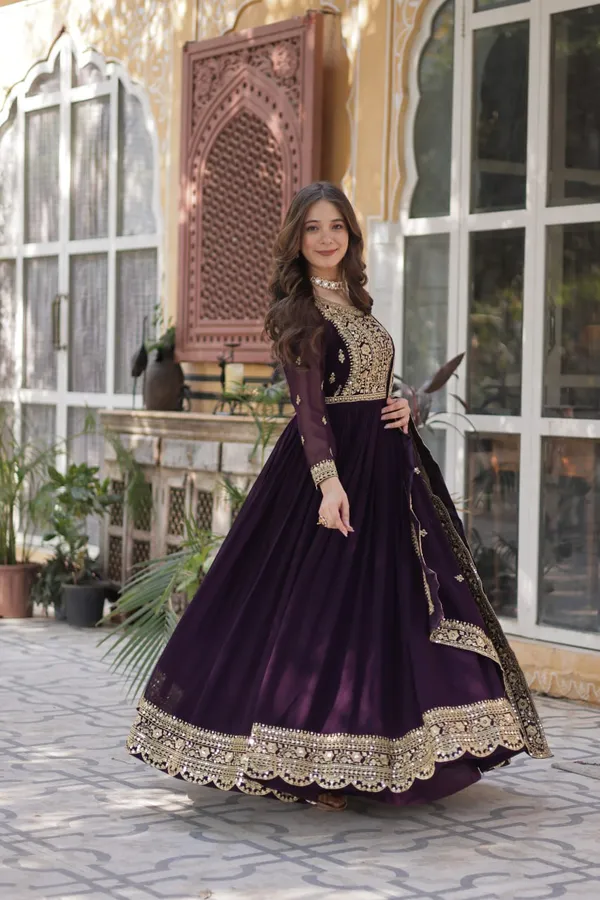 Women_S_Luxurious_Plum_Velvet_Anarkali_Gown_With_Heavy_Gold_Zari_Sequin_Embroidery_Perfect_For_Weddings_Grand_Festivities