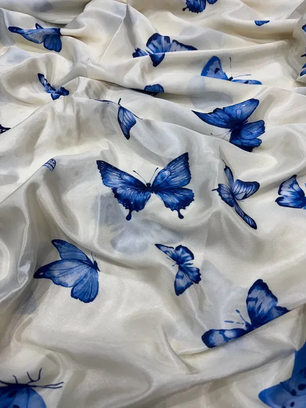 Women_S_Chic_Snow_White_Georgette_Saree_With_Vibrant_Blue_Butterfly_Digital_Print_Contrasting_Border_Perfect_For_Casual_Outings_Day_Events