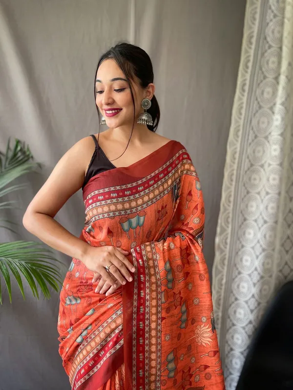 Women_S_Artistic_Terracotta_Orange_Linen_Saree_With_Kalamkari_Inspired_Print_Tassel_Detailing_Perfect_For_Casual_Festivities_Cultural_Events
