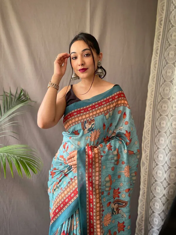 Women_S_Artistic_Terracotta_Orange_Linen_Saree_With_Kalamkari_Inspired_Print_Tassel_Detailing_Perfect_For_Casual_Festivities_Cultural_Events