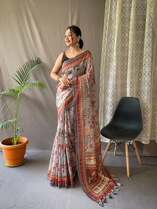 Women_S_Artistic_Terracotta_Orange_Linen_Saree_With_Kalamkari_Inspired_Print_Tassel_Detailing_Perfect_For_Casual_Festivities_Cultural_Events