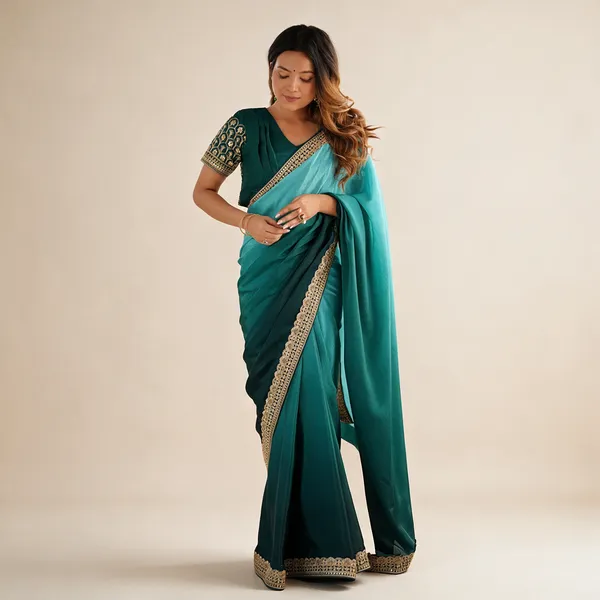 Womens_Elegant_Ombre_Sea_Blue_Georgette_Saree_With_Intricate_Golden_Zari_Stone_Embellishments_Complete_With_Heavily_Worked_Blouse_For_Festive_Wedding_Wear