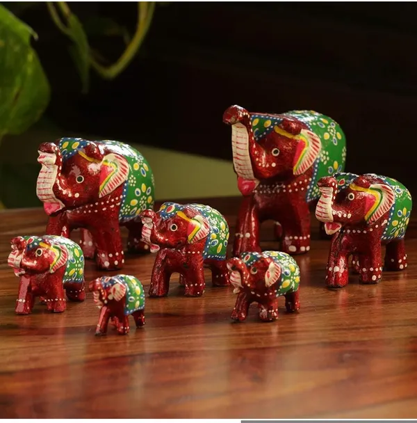 Seven_Tuskers_in_Maroon'_Decorative_Elephant_Showpieces_for_Home_Décor_(Set_of_7,_Fibre)