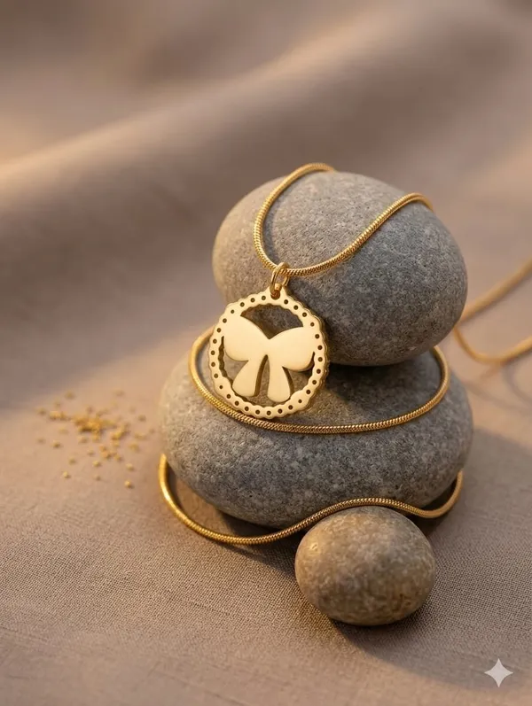 GOLD_BOW_PENDANT_NECKLACE