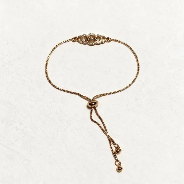 Gold_Alloy_Love_Motif_Adjustable_Bracelet_For_Women