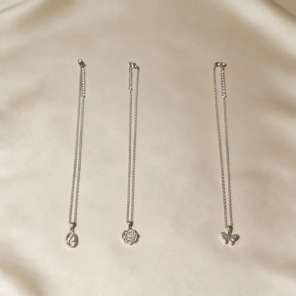 Gold_Alloy_Multi_Pendant_Necklace_Set_For_Women