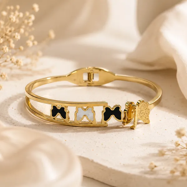 Gold_Toned_Black_And_White_Bow_Charm_Bangle_Bracelet_For_Women