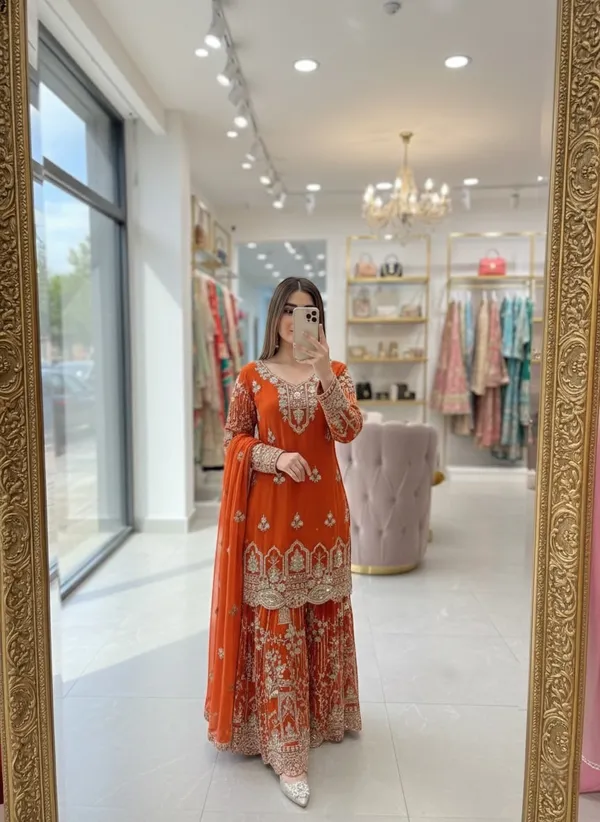 Orange_Faux_Georgette_Embroidered_Sharara_Suit_For_Women