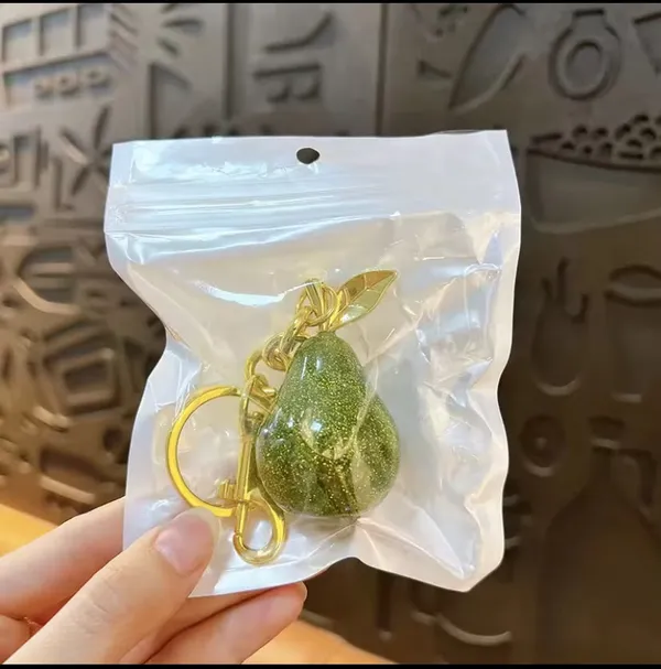 Green_And_Golden_Stainless_Steel_Gold_Plated_18_Carat_Keychain_For_Women