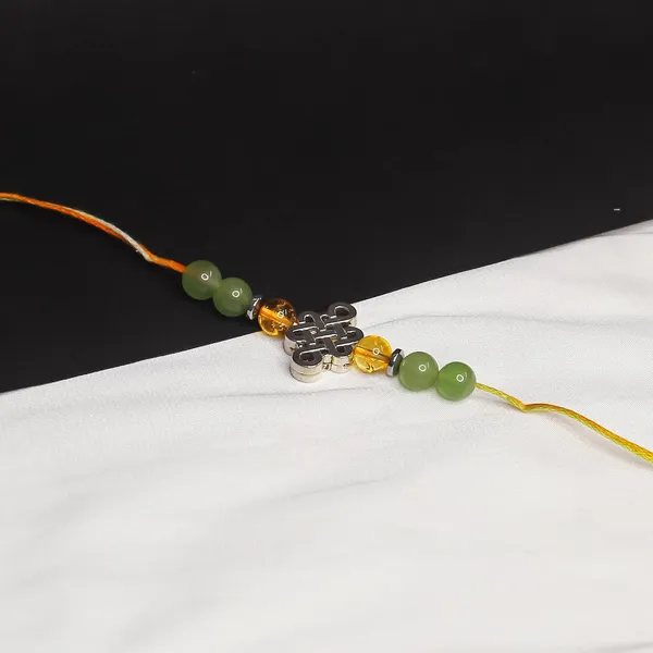 Citrine_And_Green_Aventurine_Silver_Charm_Crystal_Rakhi_For_Brother_Prosperity,_Luck,_And_Healing_Energy_Bracelet_Chakra_Balancing_Rakhi_For_Raksha_Bandhan
