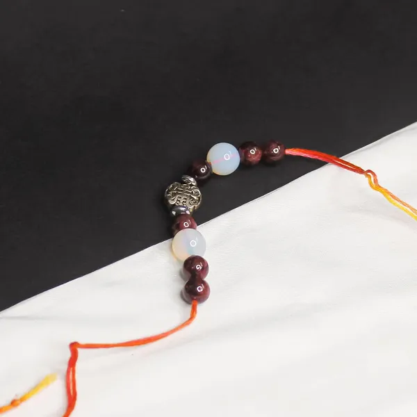 Opalite_And_Garnet_Crystal_Rakhi_For_Your_Brother_|_Boost_Positive_Energy_&_Emotional_Healing_|_Chakra_Balancing_|_Perfect_Raksha_Bandhan_Gift