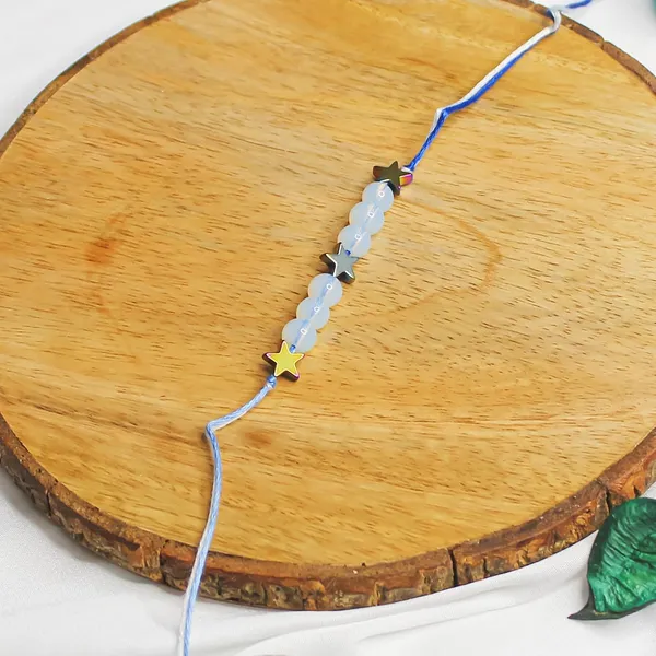 Elegant_Crystal_Rakhi_For_Brother_–_Symbol_Of_Peace,_Love_&_Emotional_Healing_|_Handmade_Spiritual_Raksha_Bandhan_Gift