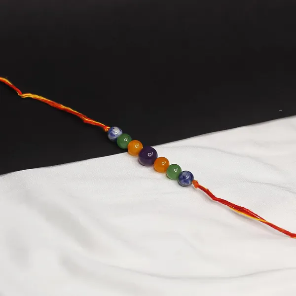 Elegant_Crystal_Rakhi_For_Brother_–_Symbol_Of_Peace,_Love_&_Emotional_Healing_|_Handmade_Spiritual_Raksha_Bandhan_Gift