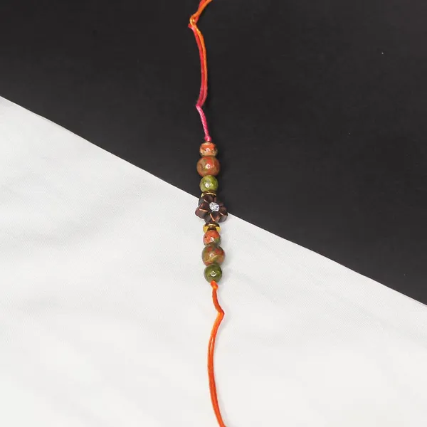Elegant_Crystal_Rakhi_For_Brother_–_Symbol_Of_Peace,_Love_&_Emotional_Healing_|_Handmade_Spiritual_Raksha_Bandhan_Gift