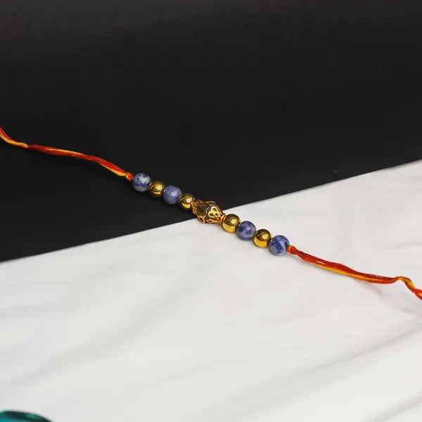 Elegant_Crystal_Rakhi_For_Brother_–_Symbol_Of_Peace,_Love_&_Emotional_Healing_|_Handmade_Spiritual_Raksha_Bandhan_Gift