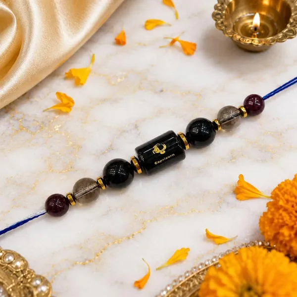 Capricorn_Rashi_Rakhi_For_Brother_-_The_Unshaken_Resolve_Drudh_Sankalp_|_Smoky_Quartz_Crystal_|_Spiritual_Zodiac_|_Reiki_Energized_Raksha_Bandhan_Gift