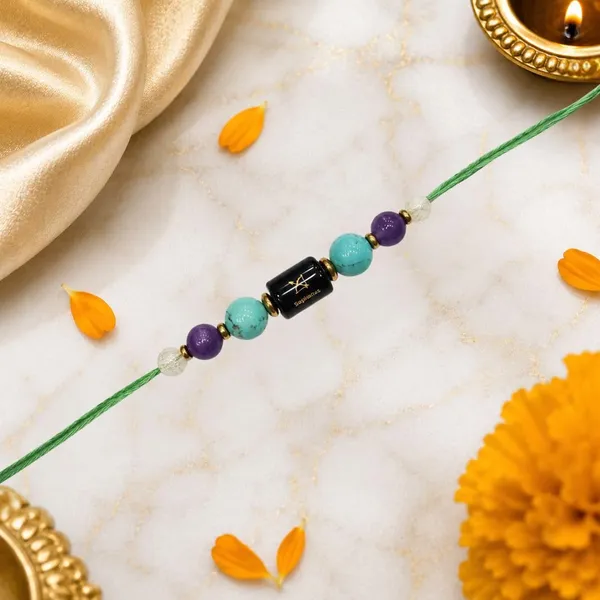 Sagittarius_Rashi_Rakhi_For_Brother_-_The_Wandering_Sage_Gyaan_Yatri_|_Amethyst_Turquoise_Citrine_Crystal_|_Spiritual_Zodiac_|_Reiki_Energized_Raksha_Bandhan_Gift