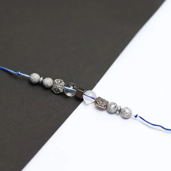 Clear_Quartz_And_Grey_Jasper_Crystal_Rakhi_For_Your_Brother_Healing,_Protection,_And_Balance_Perfect_Raksha_Bandhan_Gift