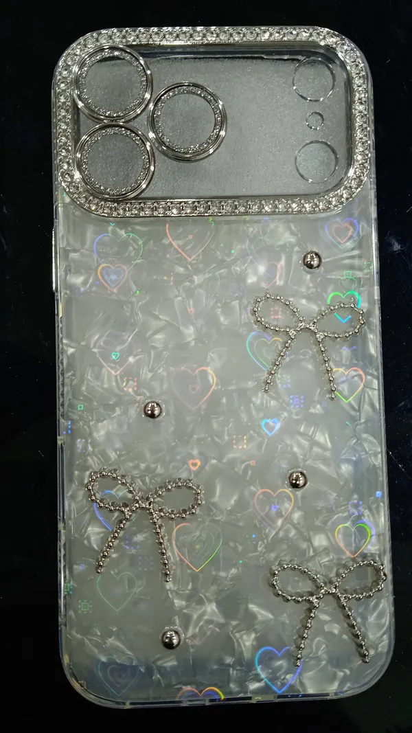 Holographic_Bow_Embellished_Acrylic_Phone_Case_For_Iphone_17_Pro