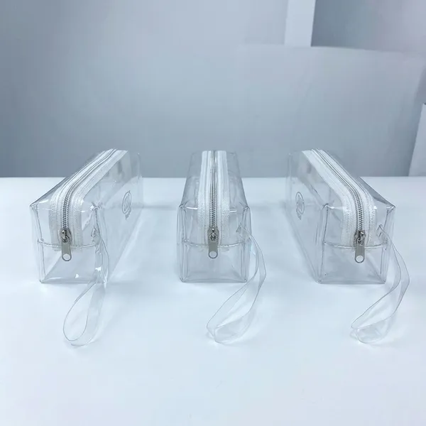 Transparent_Plastic_Zipper_Pencil_Pouch_With_Wrist_Strap_Pack_of_3