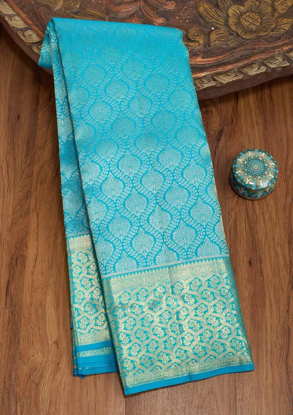 Turquoise_Blue_Silk_Jaal_Gold_Zariwork_Saree_With_Matching_Blouse_Piece