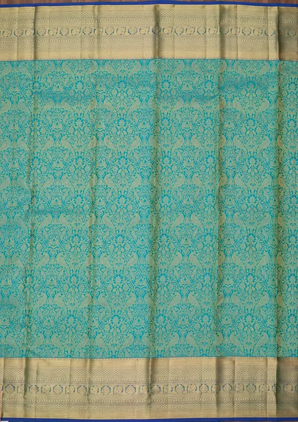 Turquoise_Blue_Silk_Jaal_Saree_With_Matching_Blouse_Piece