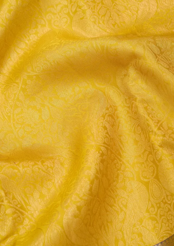 Yellow_Silk_Jaal_Saree_With_Matching_Blouse_Piece